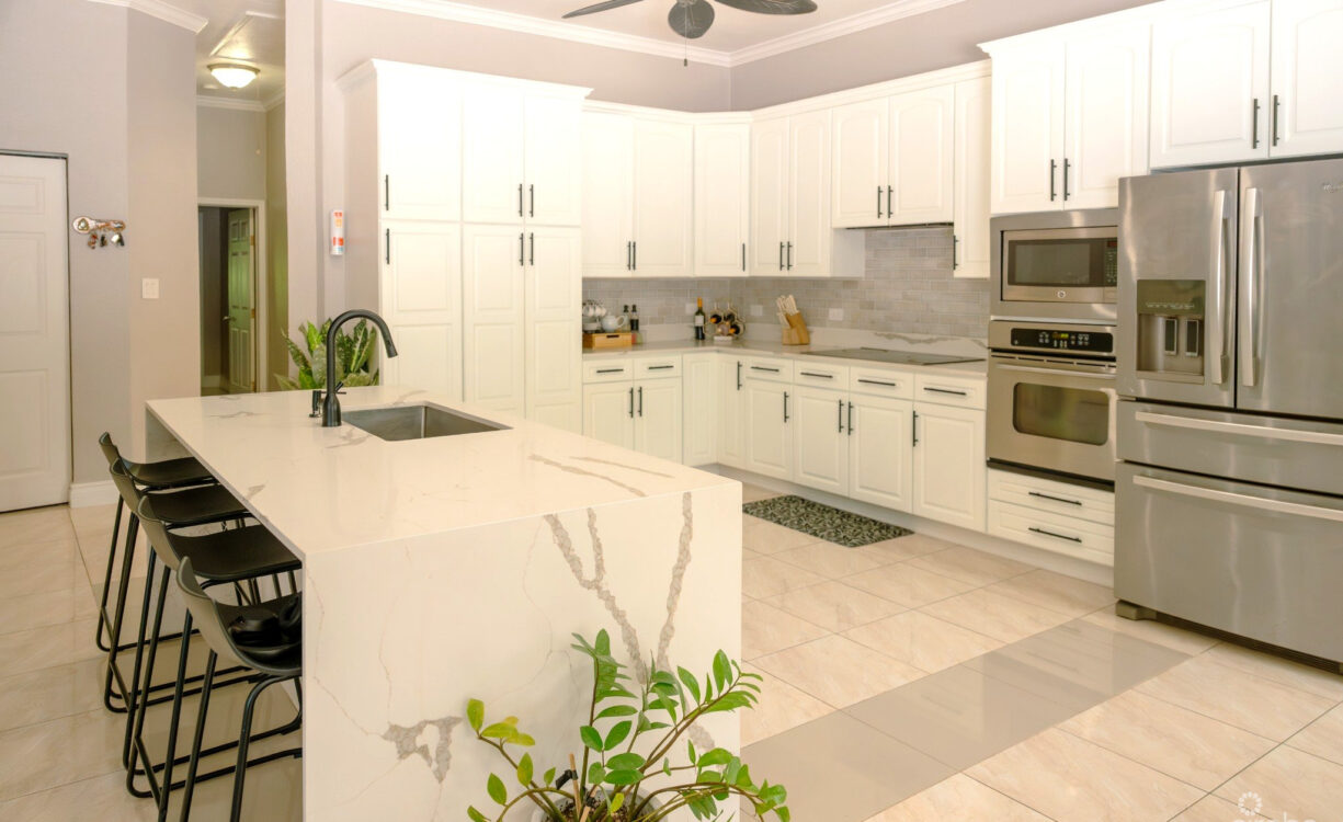 KITCHEN WITH PLENTY OF ADDITIONAL STORAGE AND A BUILT IN PANTRY - 4 BEDROOM BEAUTIFUL FAMILY HOME IN SAVANNAH