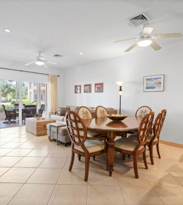 open concept kitchen bar, dining area and living room