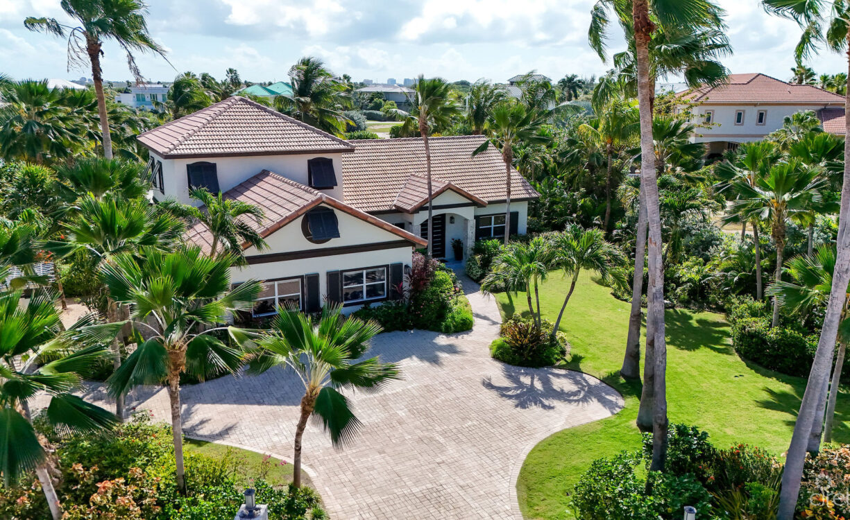 FULLY RENOVATED 4-BED CANAL FRONT HOME WITH DEN & DOCK | THE SHORES