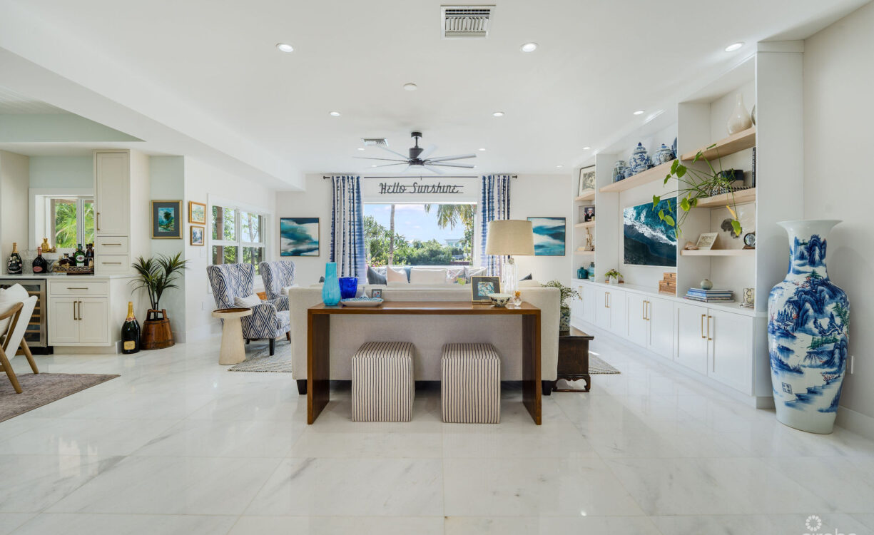 FULLY RENOVATED 4-BED CANAL FRONT HOME WITH DEN & DOCK | THE SHORES