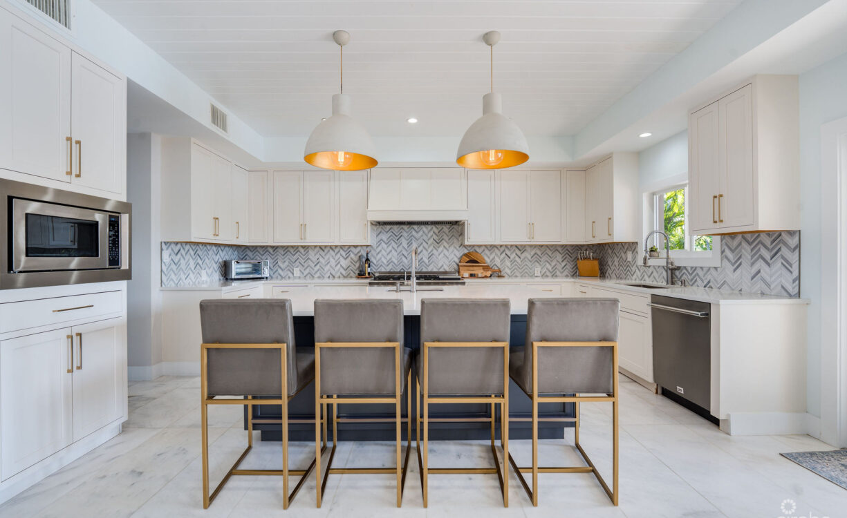FULLY RENOVATED 4-BED CANAL FRONT HOME WITH DEN & DOCK | THE SHORES