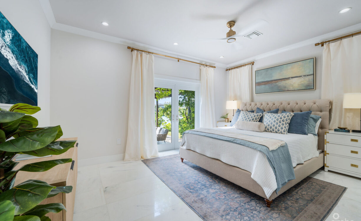FULLY RENOVATED 4-BED CANAL FRONT HOME WITH DEN & DOCK | THE SHORES
