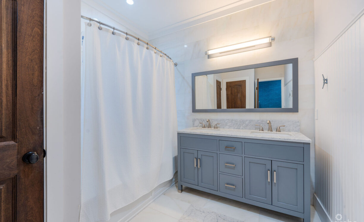 FULLY RENOVATED 4-BED CANAL FRONT HOME WITH DEN & DOCK | THE SHORES