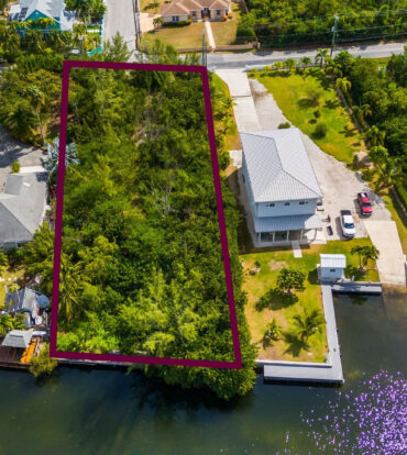 RED BAY  WOODSTOCK DR OVERSIZED CANAL FRONT LOT