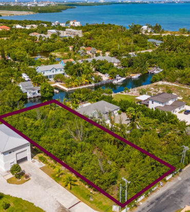 RED BAY  WOODSTOCK DR OVERSIZED CANAL FRONT LOT