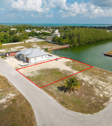0.24 ACRE CANAL LOT IN GATED COMMUNITY - MUSTIQUE COVE