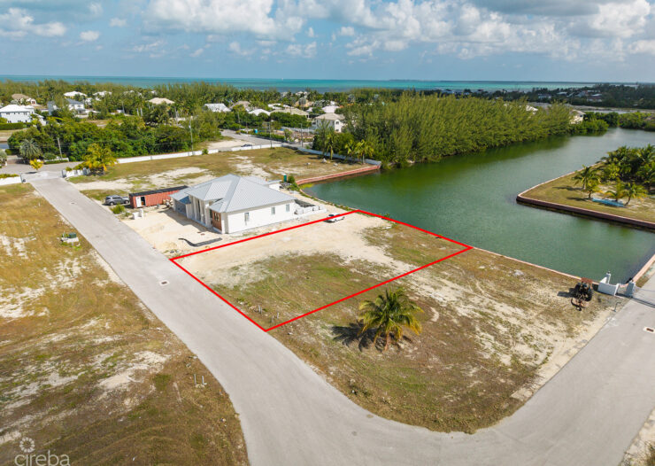 0.24 ACRE CANAL LOT IN GATED COMMUNITY - MUSTIQUE COVE
