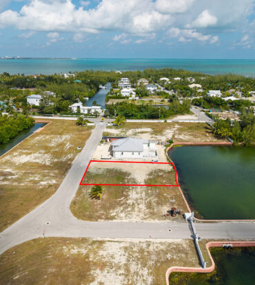 0.24 ACRE CANAL LOT IN GATED COMMUNITY - MUSTIQUE COVE