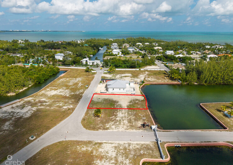 0.24 ACRE CANAL LOT IN GATED COMMUNITY - MUSTIQUE COVE
