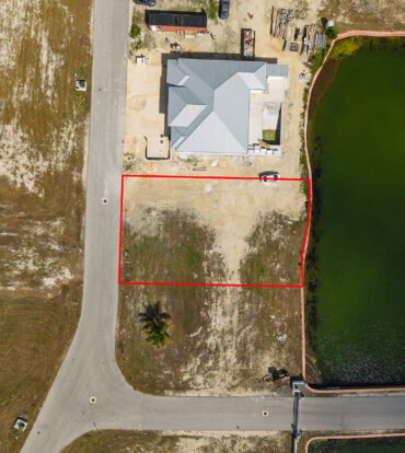 0.24 ACRE CANAL LOT IN GATED COMMUNITY - MUSTIQUE COVE