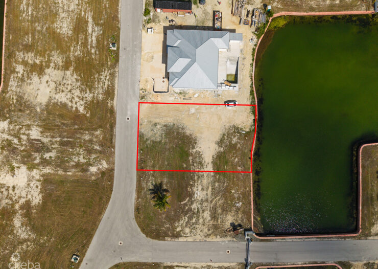 0.24 ACRE CANAL LOT IN GATED COMMUNITY - MUSTIQUE COVE