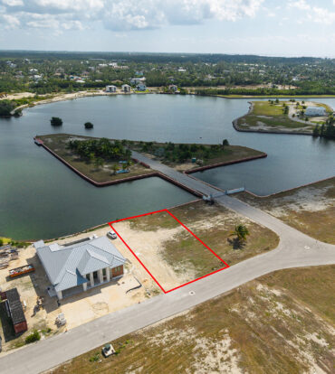 0.24 ACRE CANAL LOT IN GATED COMMUNITY - MUSTIQUE COVE