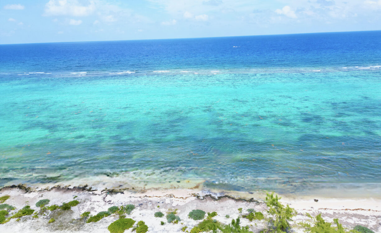 RUM POINT BEACHFRONT LOT W/CORAL REEF STEPS AWAY