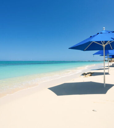 CAYMAN REEF RESORT BEACHFRONT WITH FUTURE REDEVELOPMENT