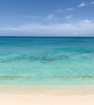 CAYMAN REEF RESORT BEACHFRONT WITH FUTURE REDEVELOPMENT