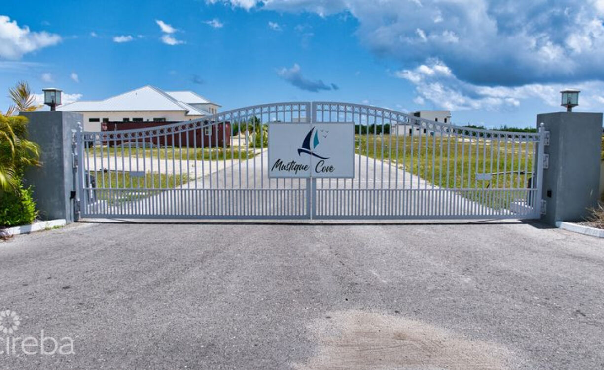 MUSTIQUE COVE LOT WITH DOC IN A PRIVATE GATED COMMUNITY