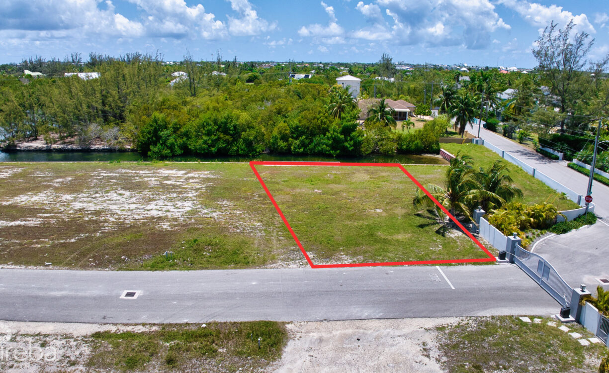 MUSTIQUE COVE LOT WITH DOC IN A PRIVATE GATED COMMUNITY