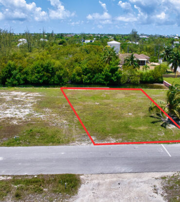 MUSTIQUE COVE LOT WITH DOC IN A PRIVATE GATED COMMUNITY