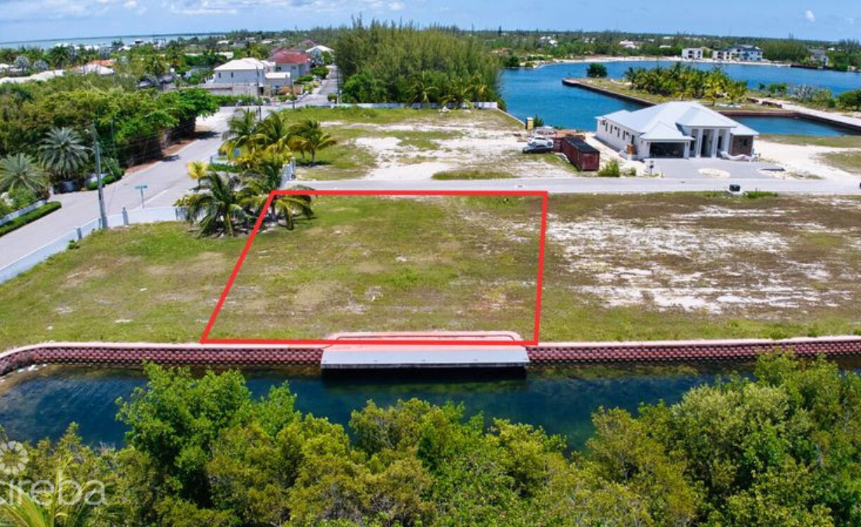 MUSTIQUE COVE LOT WITH DOC IN A PRIVATE GATED COMMUNITY