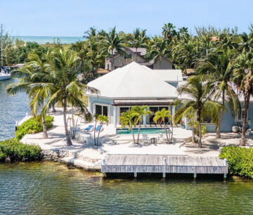 CORNER CANAL FRONT HOME WITH BEAUTIFUL VIEWS