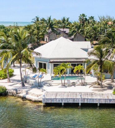 CORNER CANAL FRONT HOME WITH BEAUTIFUL VIEWS