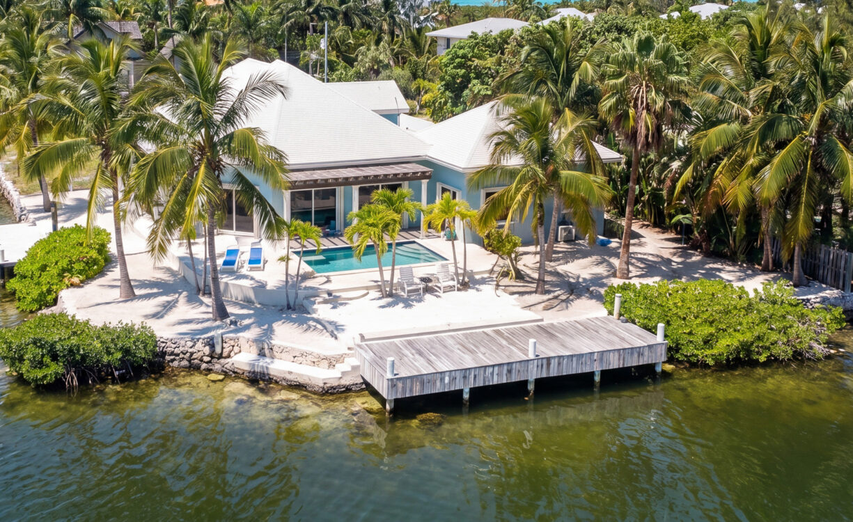 CORNER CANAL FRONT HOME WITH BEAUTIFUL VIEWS