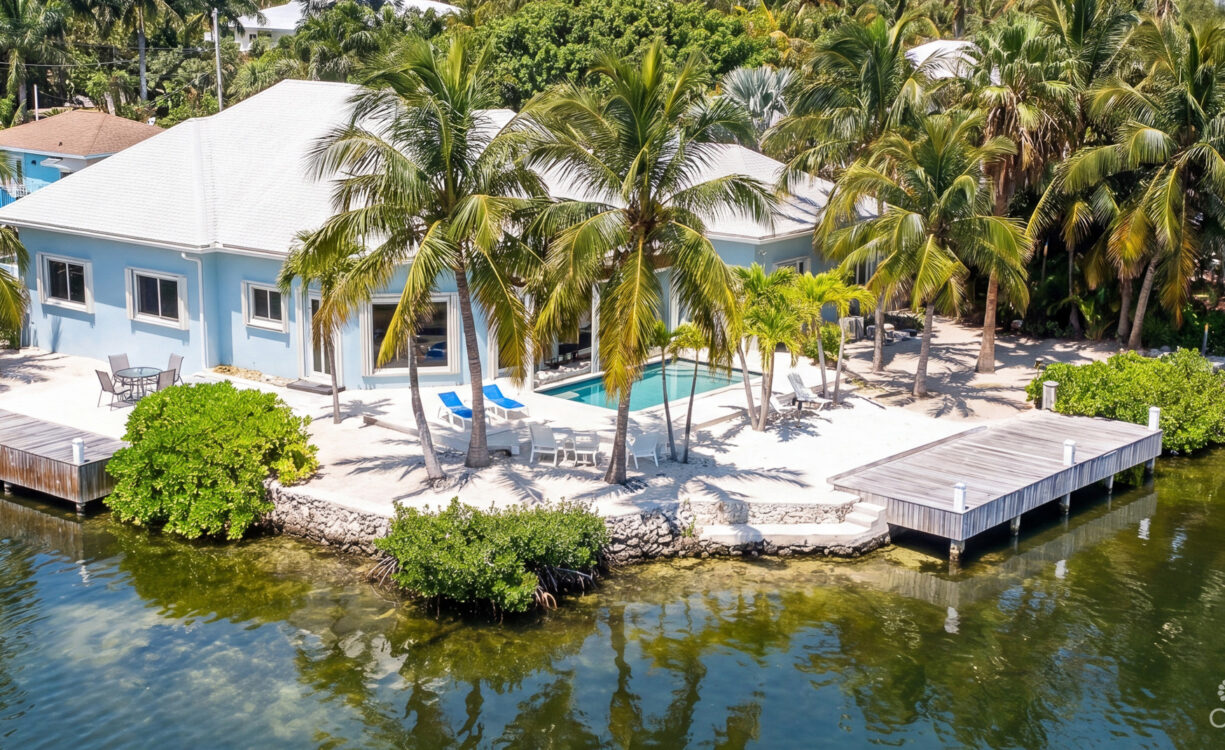 CORNER CANAL FRONT HOME WITH BEAUTIFUL VIEWS
