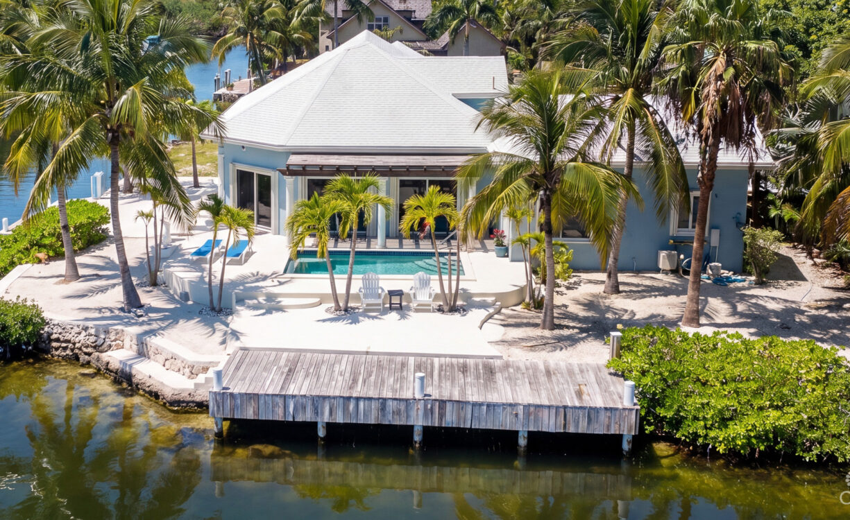 CORNER CANAL FRONT HOME WITH BEAUTIFUL VIEWS