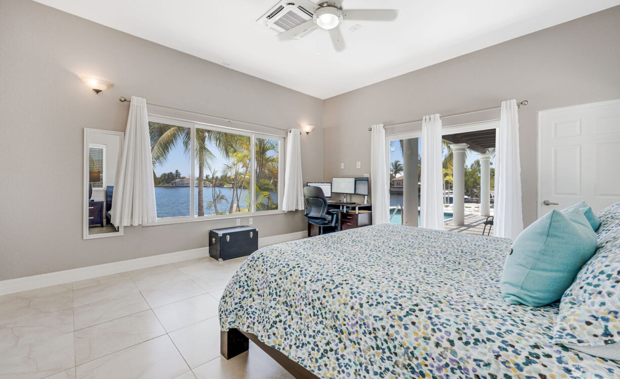 CORNER CANAL FRONT HOME WITH BEAUTIFUL VIEWS