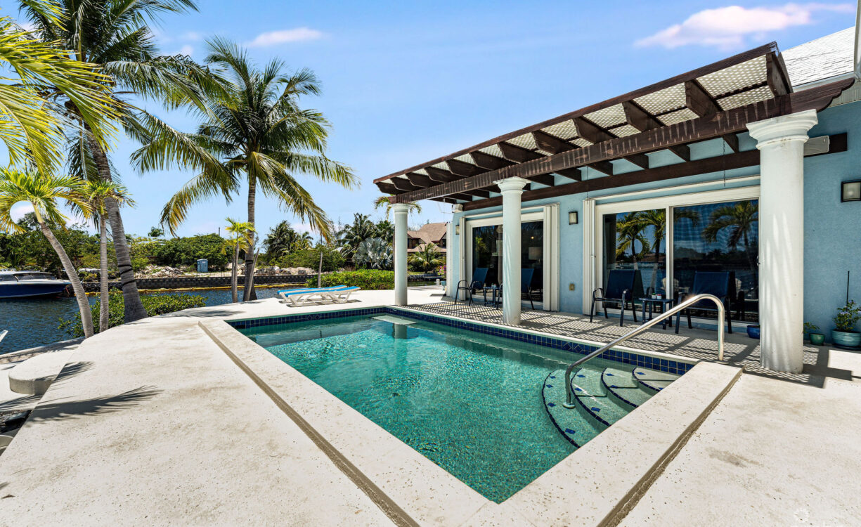 CORNER CANAL FRONT HOME WITH BEAUTIFUL VIEWS