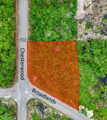 LARGE CORNER LOT .366 ACRE IN LOOKOUT GARDENS